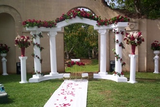 white colonnade arch